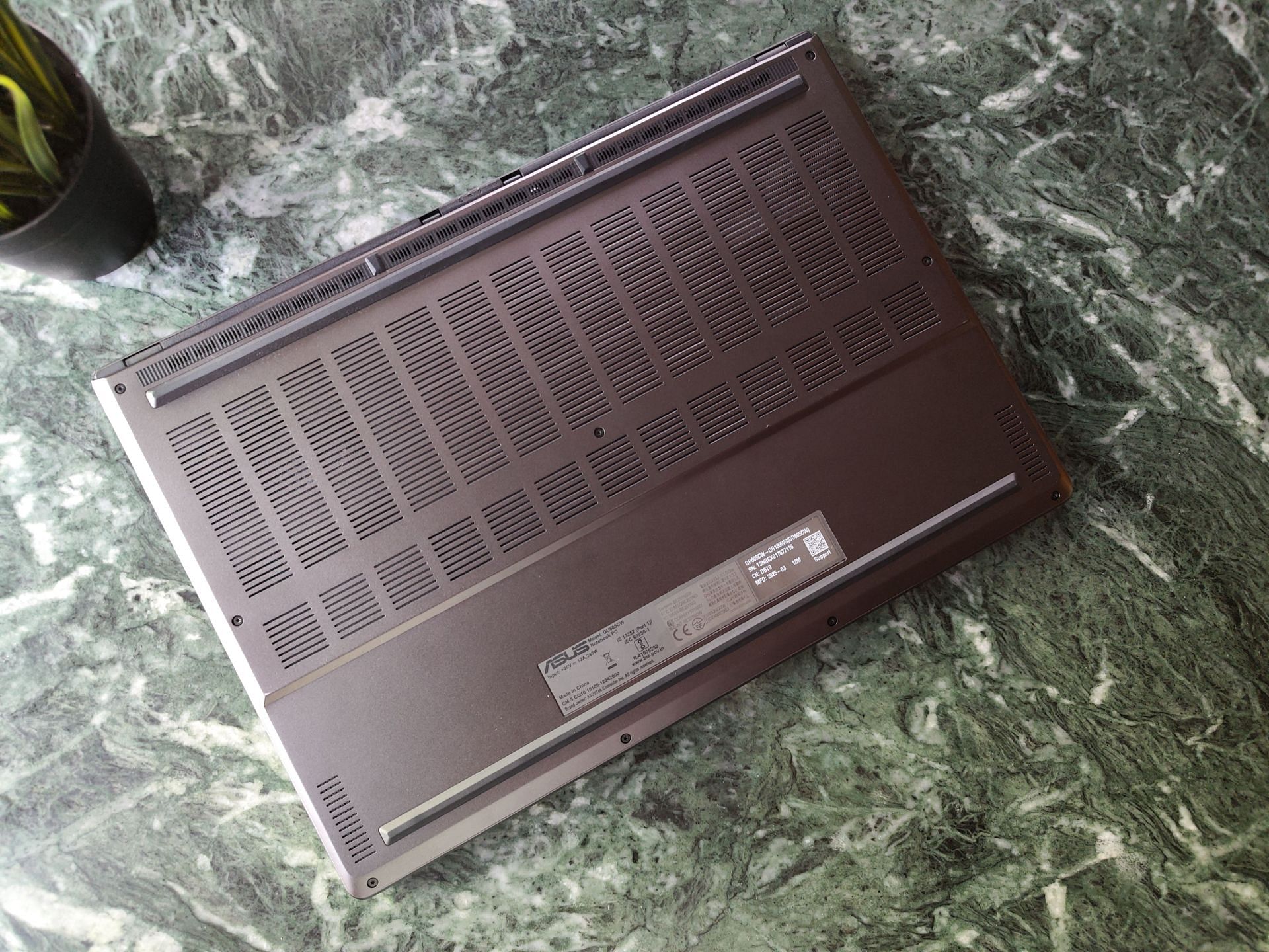 The Zephyrus G16 bundles a ton of breathing room on the back to compensate for its compact form factor (Image via Sportskeeda)
